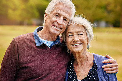 Buy stock photo Hug, senior and portrait of a couple in a park to relax, be happy and bonding in Norway. Love, smile and elderly man and woman hugging, giving affection and together in nature during retirement