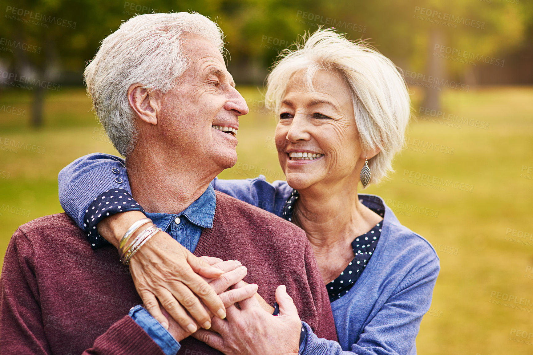 Buy stock photo Shot of a happy senior couple in the park