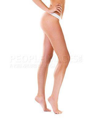Buy stock photo Woman, legs and body care in studio, wellness and skincare for smooth skin on white background. Female person, mockup space and cosmetics treatment or dermatology, self care and underwear for hygiene