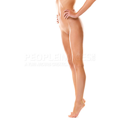 Buy stock photo Cropped shot of a woman posing nude against a white background