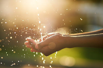 Buy stock photo Hands, water and lens flare in nature with clean or bokeh, wellness with splash and natural. Fingers, hygiene and running liquid on blurred background for sustainability, awareness for environment