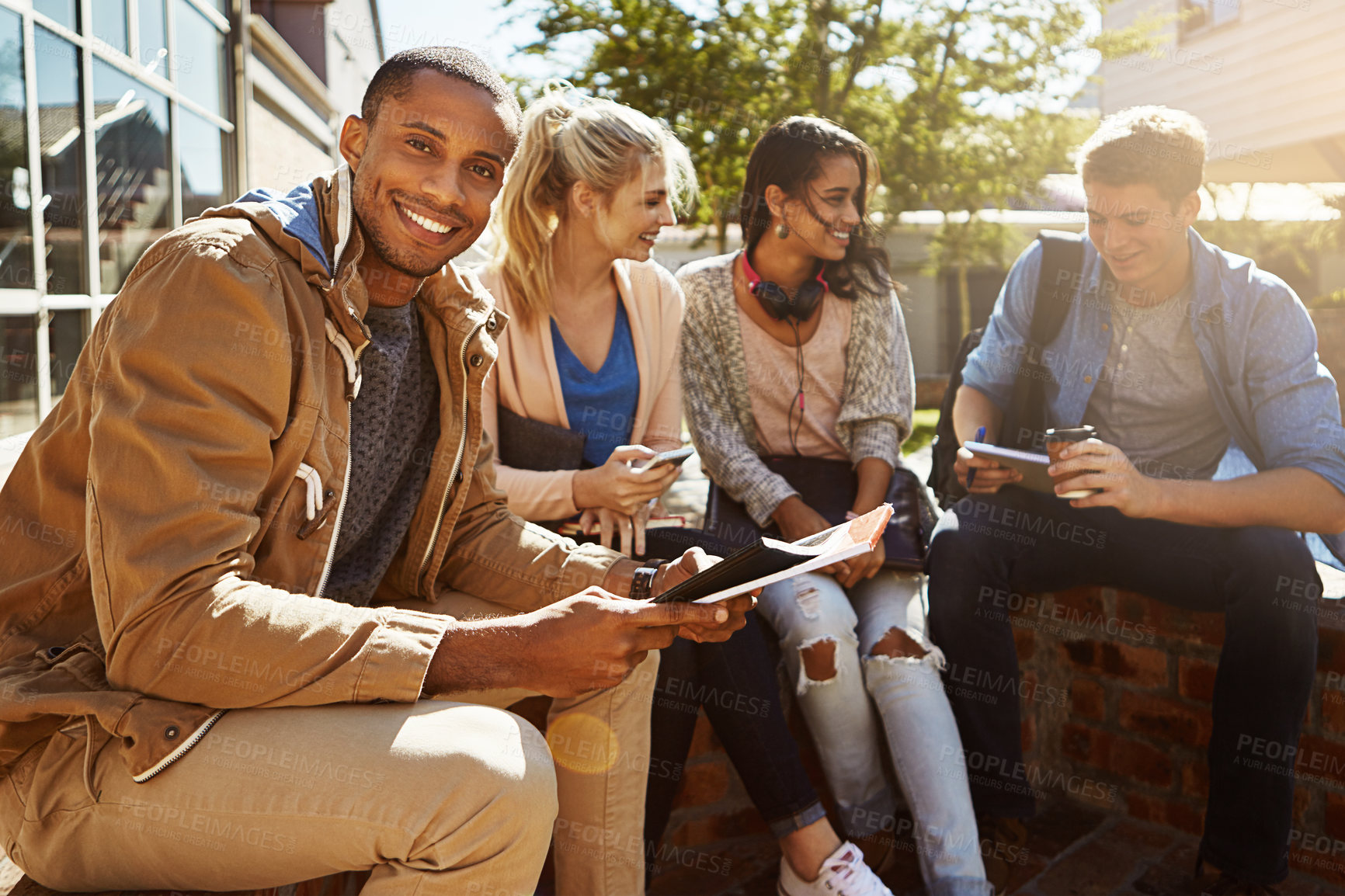 Buy stock photo Happy, man and college with students in outdoor for studying, education and scholarship. Friends, future and University with group of people on campus for learning, academy and knowledge together