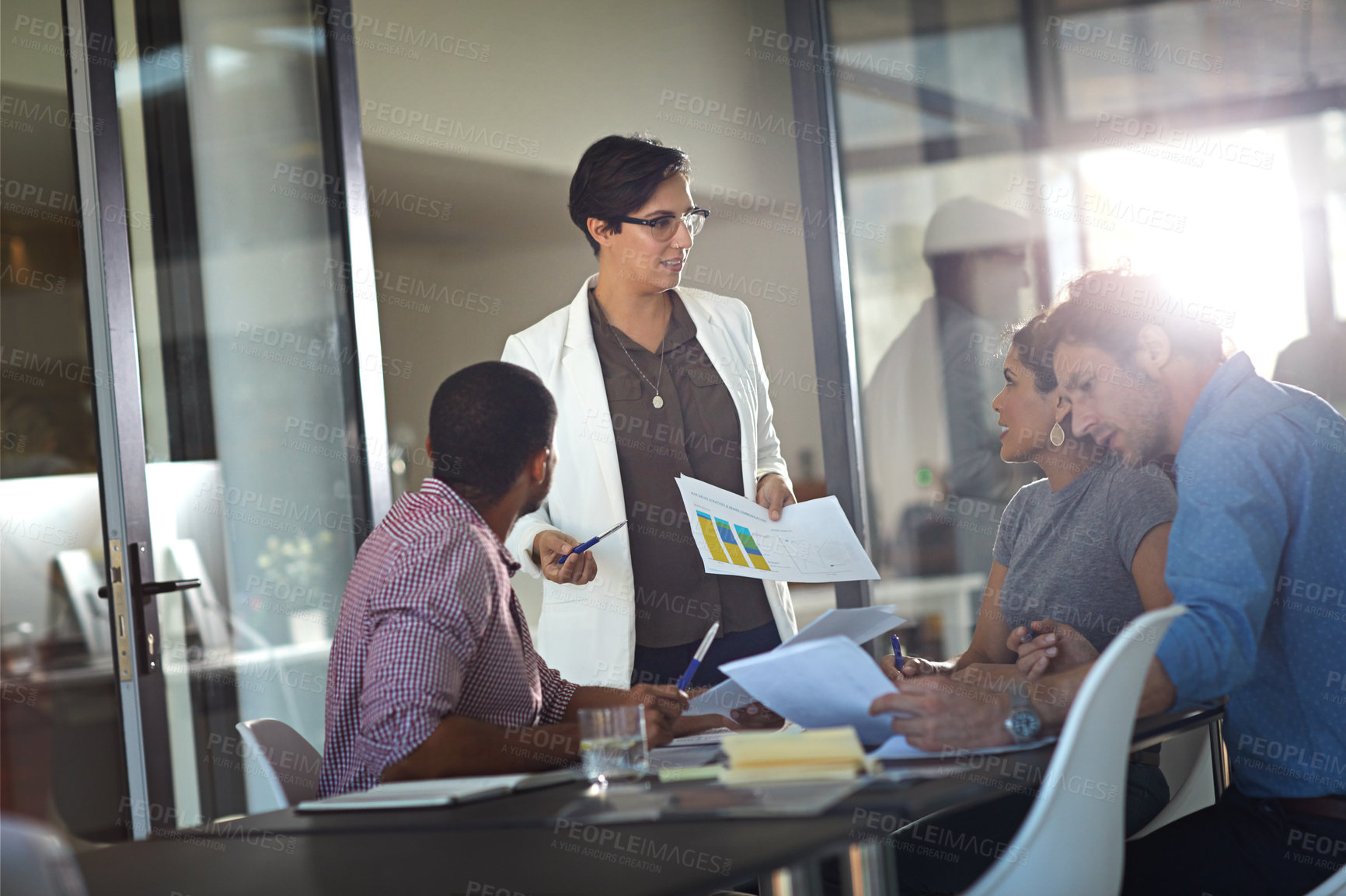 Buy stock photo Data, meeting and presentation with business woman in boardroom for feedback or report. Documents, pitch and statistics with employee people in office for proposal or review of charts and graphs