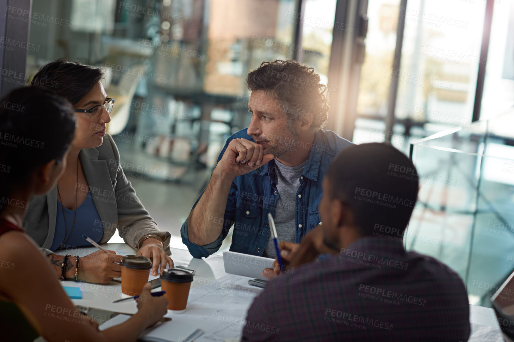 Buy stock photo Business people, tablet and teamwork in collaboration, meeting or feedback as creative in office. Technology, group and diversity for discussion, review and communication at company or digital agency