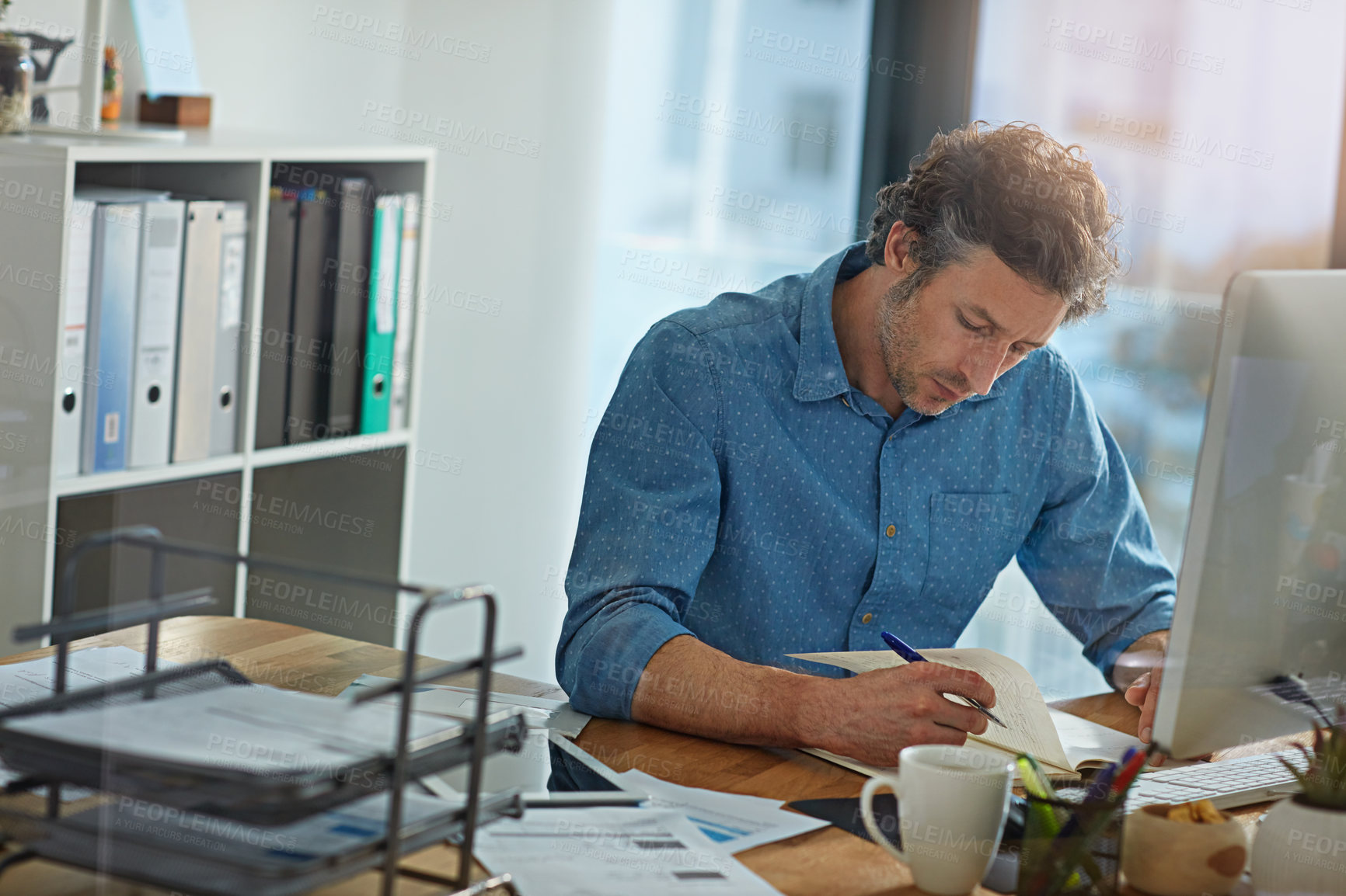 Buy stock photo Computer, notebook and research with business man in office for account manager, planning and email. Investment banker, budget report and online portfolio with person in agency for trading broker
