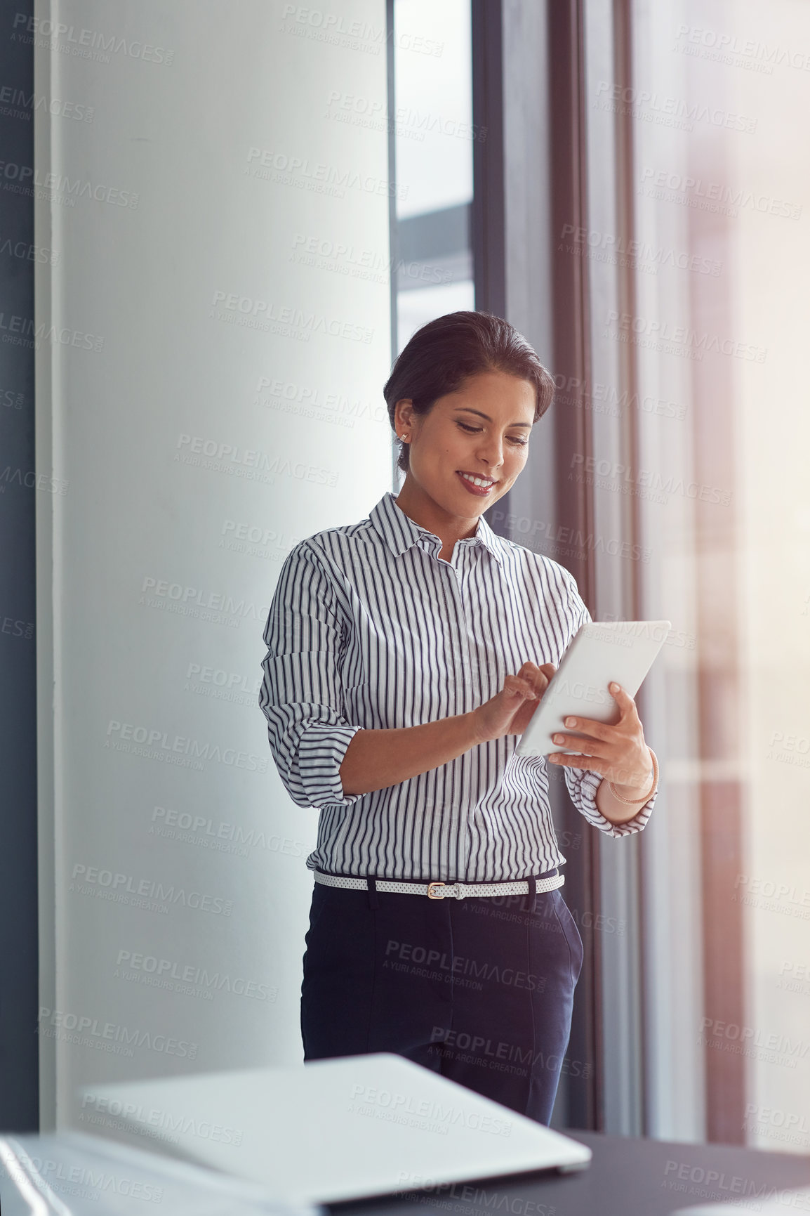 Buy stock photo Employee, woman and happy at office with tablet for drafting announcement and email marketing as hr manager. Female person, business and smile on internet for communication, networking and connection