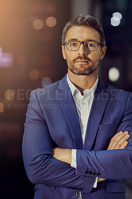Buy stock photo Confident, arms crossed and night with portrait of businessman in office for management, leadership and vision. Professional, executive and future with face of ceo focus on mindset, career or goals
