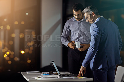 Buy stock photo Businessman, colleagues and laptop at office in night for strategy, goals and target for investment in stock market. Stock broker team, reading and computer with innovation, working late and focus