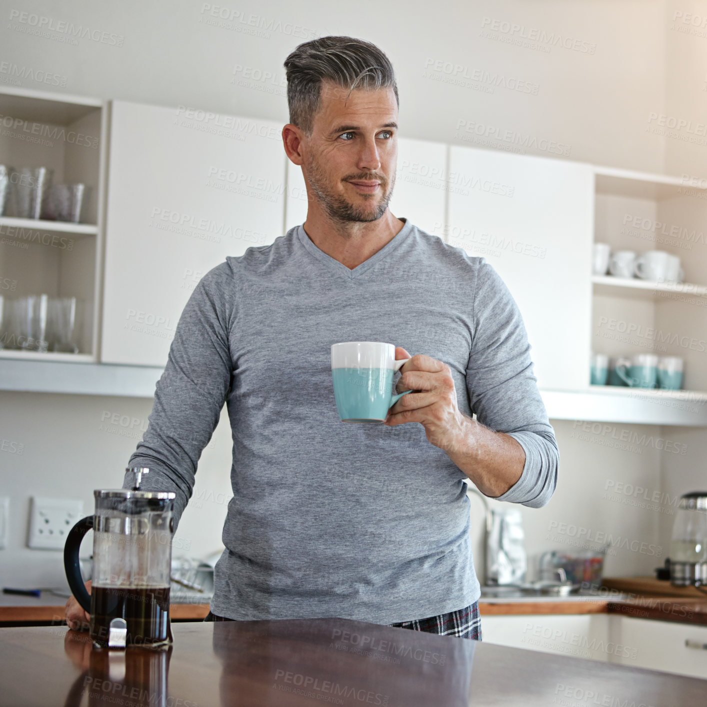 Buy stock photo Morning, happy and man in kitchen with coffee to start day with caffeine beverage, warm drink and cappuccino. Thinking, idea and person with French press for breakfast, aroma and espresso in home