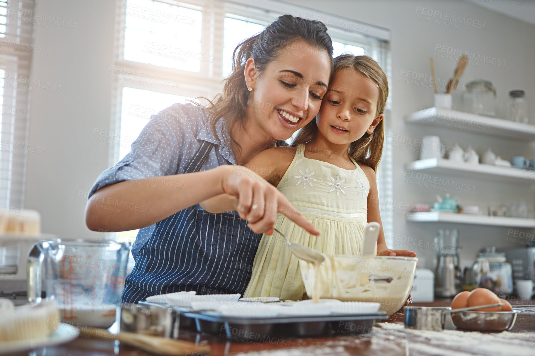 Buy stock photo Mother, kid or baking recipe in kitchen with batter preparation, teaching skills or culinary education. Family, woman or girl with mixing ingredients for cooking, bonding or child development in home