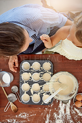 Buy stock photo Kid, playing or baking with mom, top view and flour for bonding or learning dessert recipe. Parent, nose or mother teaching girl child cooking skills for development, cupcakes or funny joke in home