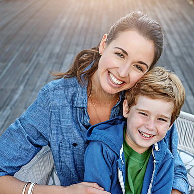 Buy stock photo Portrait of a happy mother and her son outdoors