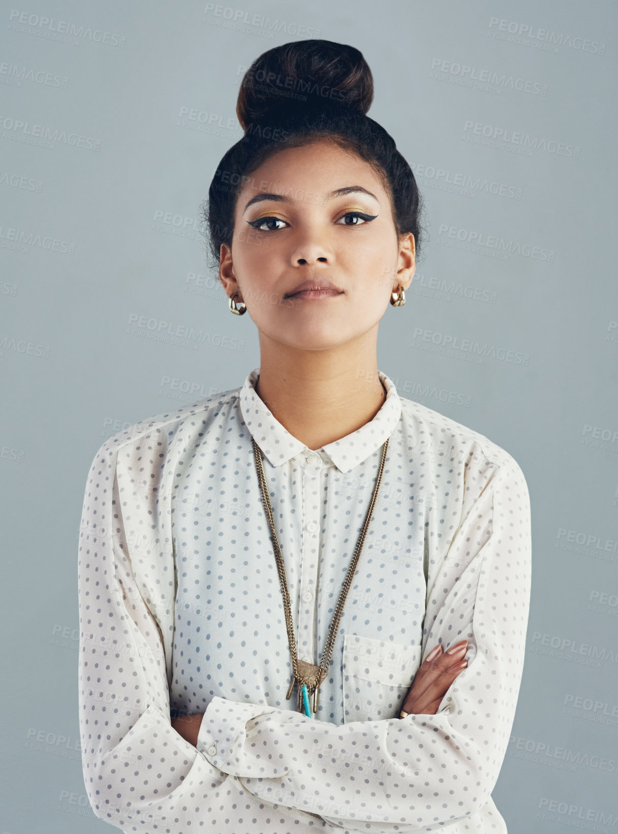 Buy stock photo Woman, portrait and arms crossed in studio for fashion, casual clothes and chic confidence for person. Female model, pride or trendy accessory by gray background for stylish outfit, beauty or hipster