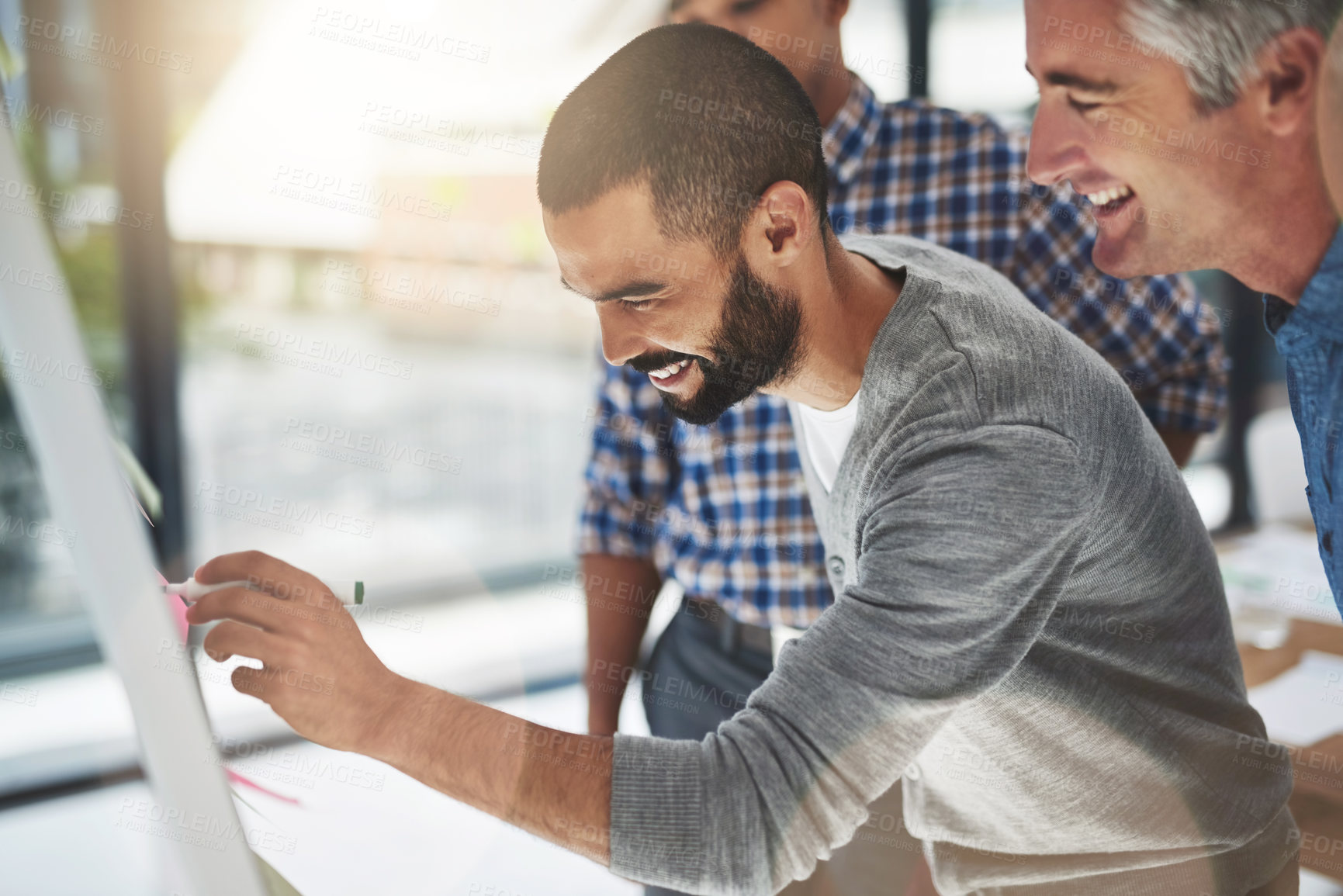 Buy stock photo Cropped shot of a group of businesspeople in a meeting