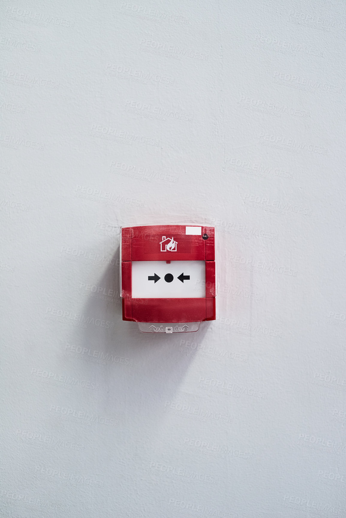 Buy stock photo Shot of a fire alarm on a wall