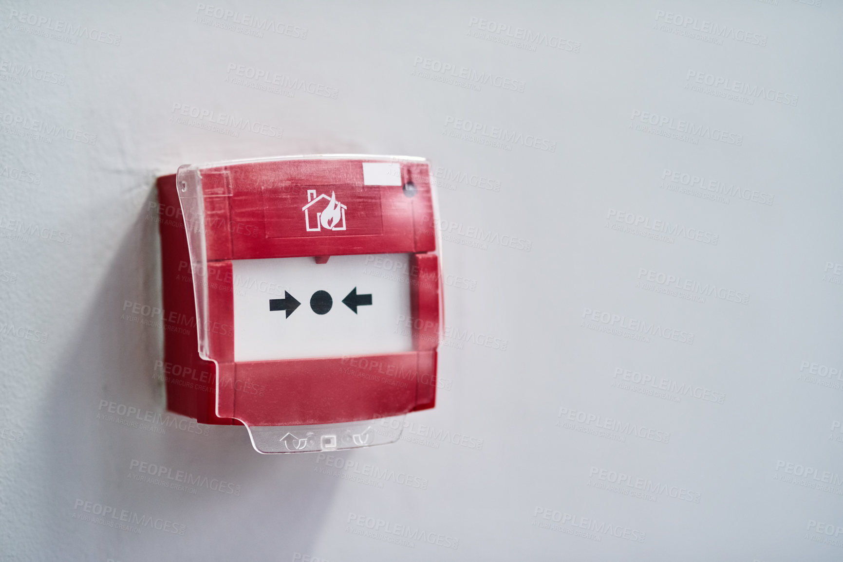 Buy stock photo Shot of a fire alarm on a wall