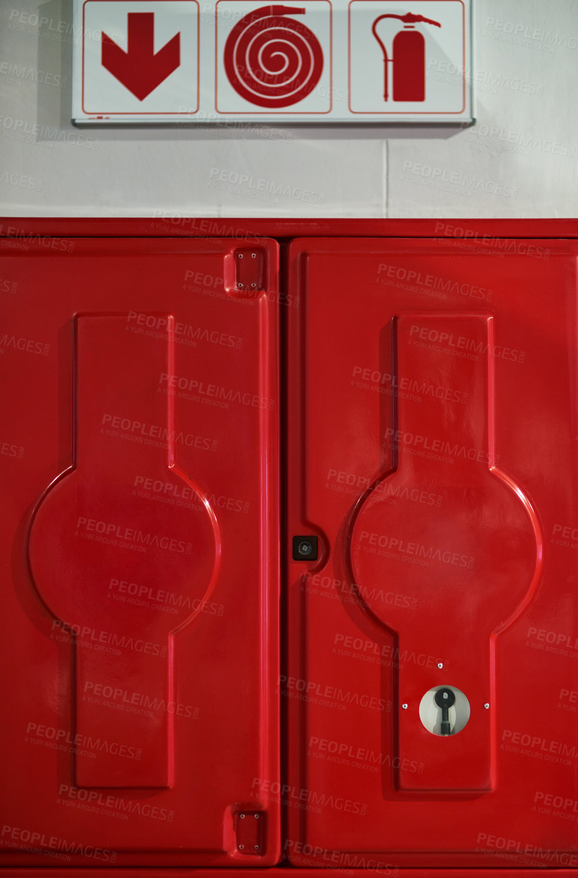 Buy stock photo Fire, sign and box with extinguisher for emergency, danger and rescue from flames or heat. Firefighting, hydrant and red locker with gear, equipment and water hose for health and safety at station