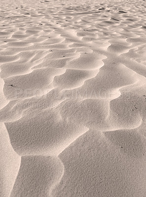 Buy stock photo Sand dunes on a windy beach in nature on a sunny day with copyspace. Closeup of scenic landscape outdoors with grainy surface texture. Peaceful and calm desert to explore for travel and tourism