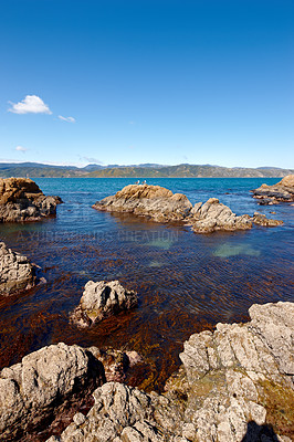 Buy stock photo Landscape, relax and rock with beach and ocean for environment, travel destination and tropical. Summer vacation, water and nature with sea horizon for mediterranean coastline, holiday and paradise