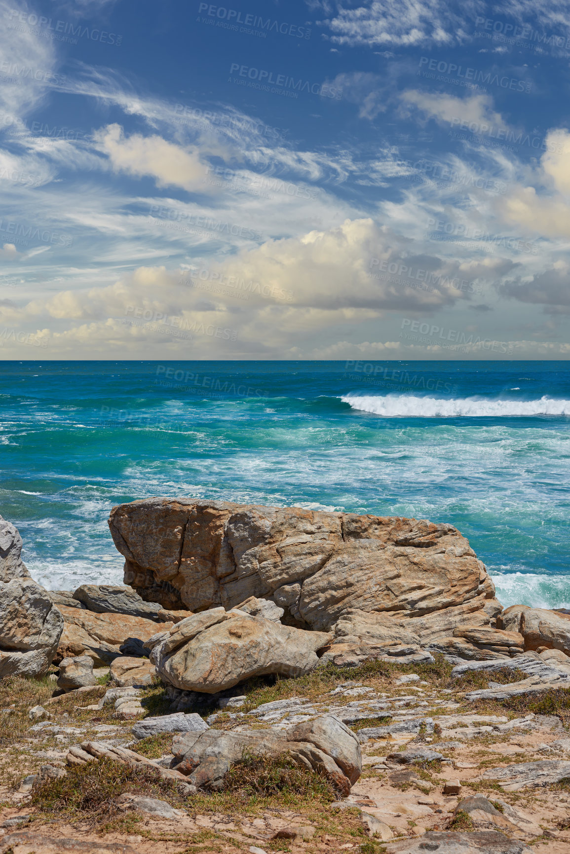 Buy stock photo Tropical, waves and rock with beach and ocean for environment, travel destination and landscape. Summer vacation, water and nature with sea horizon for mediterranean coastline, holiday and paradise