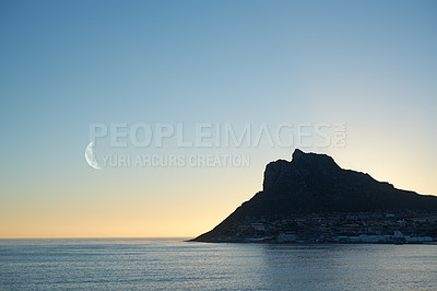 Buy stock photo Seascape, mountain and moon with beach and ocean for environment, travel destination and tropical. Summer vacation, water and nature with sea horizon for mediterranean coastline, holiday or paradise