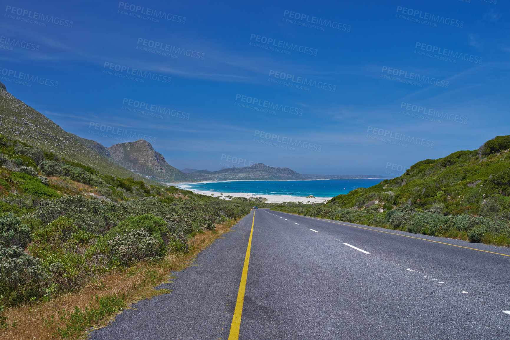 Buy stock photo Outdoor, empty and scenery of route, road and path in nature, blue sky and way for journey and trip. Highway, travel and sightseeing of mountain, mockup and environment of beach, water and California