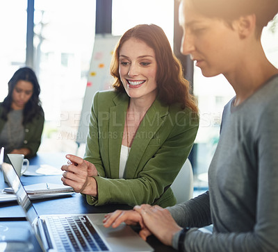 Buy stock photo Shot of a group of businesswomen working in an office