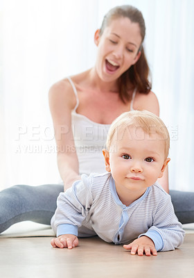 Buy stock photo Shot of a mom bonding with her baby