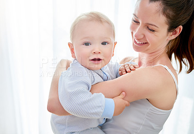 Buy stock photo Shot of a mother bonding with her baby boy