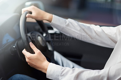 Buy stock photo Cropped shot of a businessman driving a car