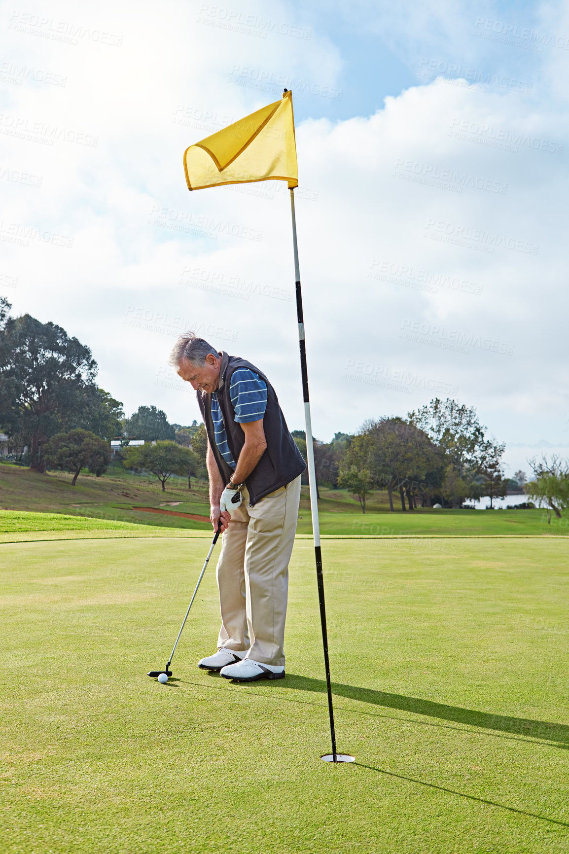 Buy stock photo Elderly man, sports and golf for retirement, fitness and training with recreation, exercise and fun. Male person, golfer and strike club on outdoor course for play, workout and practice game on field