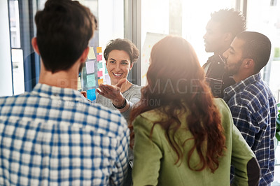 Buy stock photo Cropped shot of a group of colleagues having an office meeting