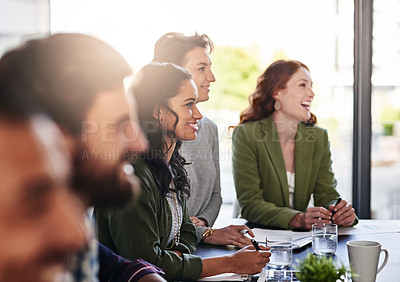 Buy stock photo Shot of a group of colleagues having an office meeting