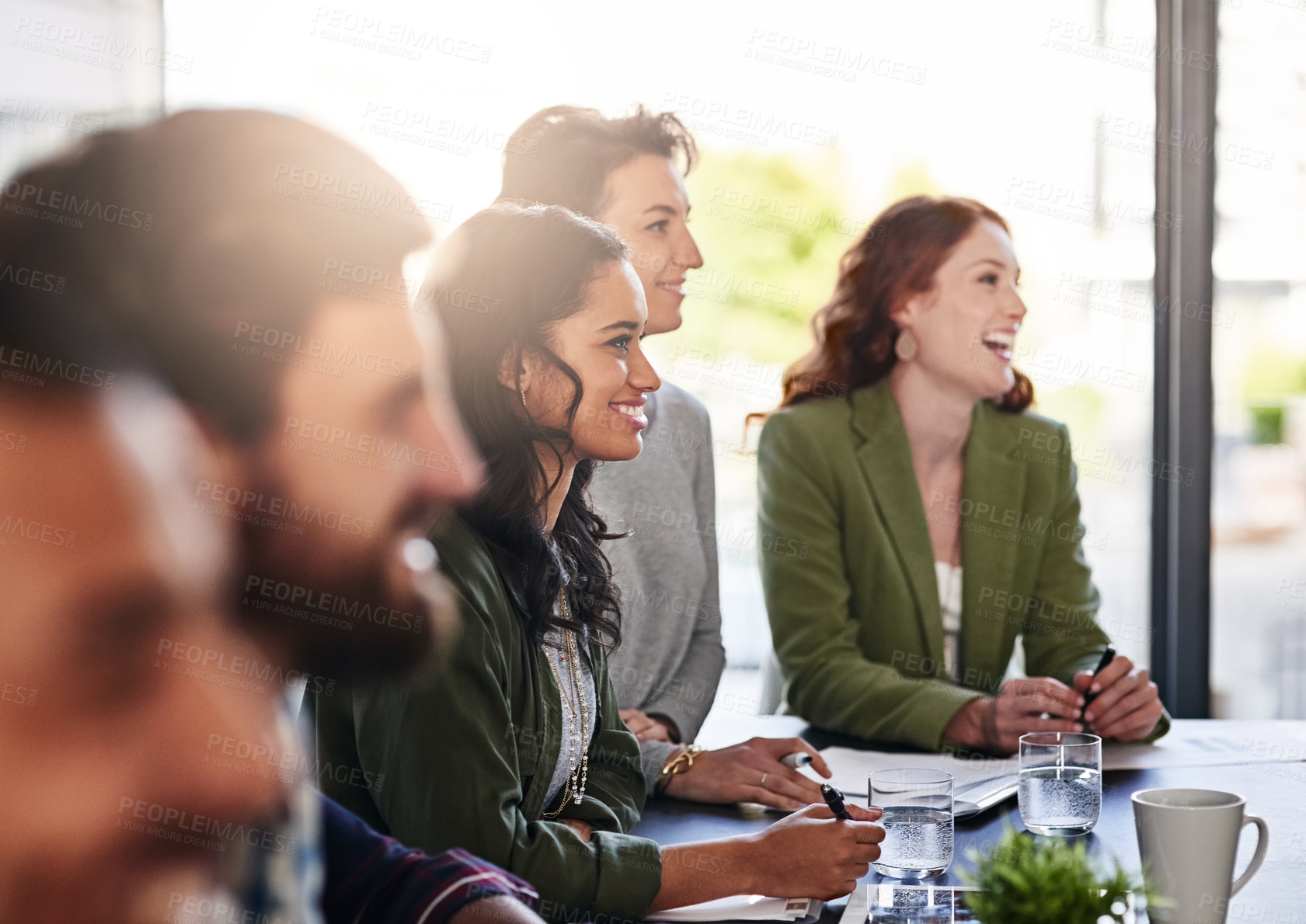 Buy stock photo Shot of a group of colleagues having an office meeting