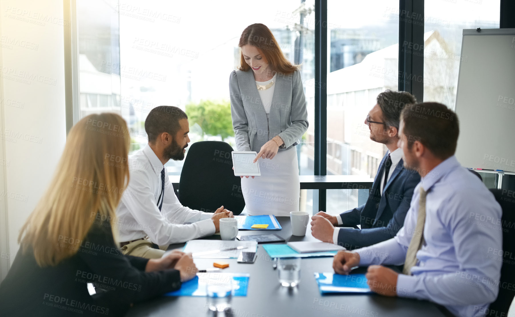 Buy stock photo Meeting, mockup or business people on tablet in presentation for feedback, discussion or teamwork. Proposal review, touchscreen and woman in office talking for news, ads space and planning online