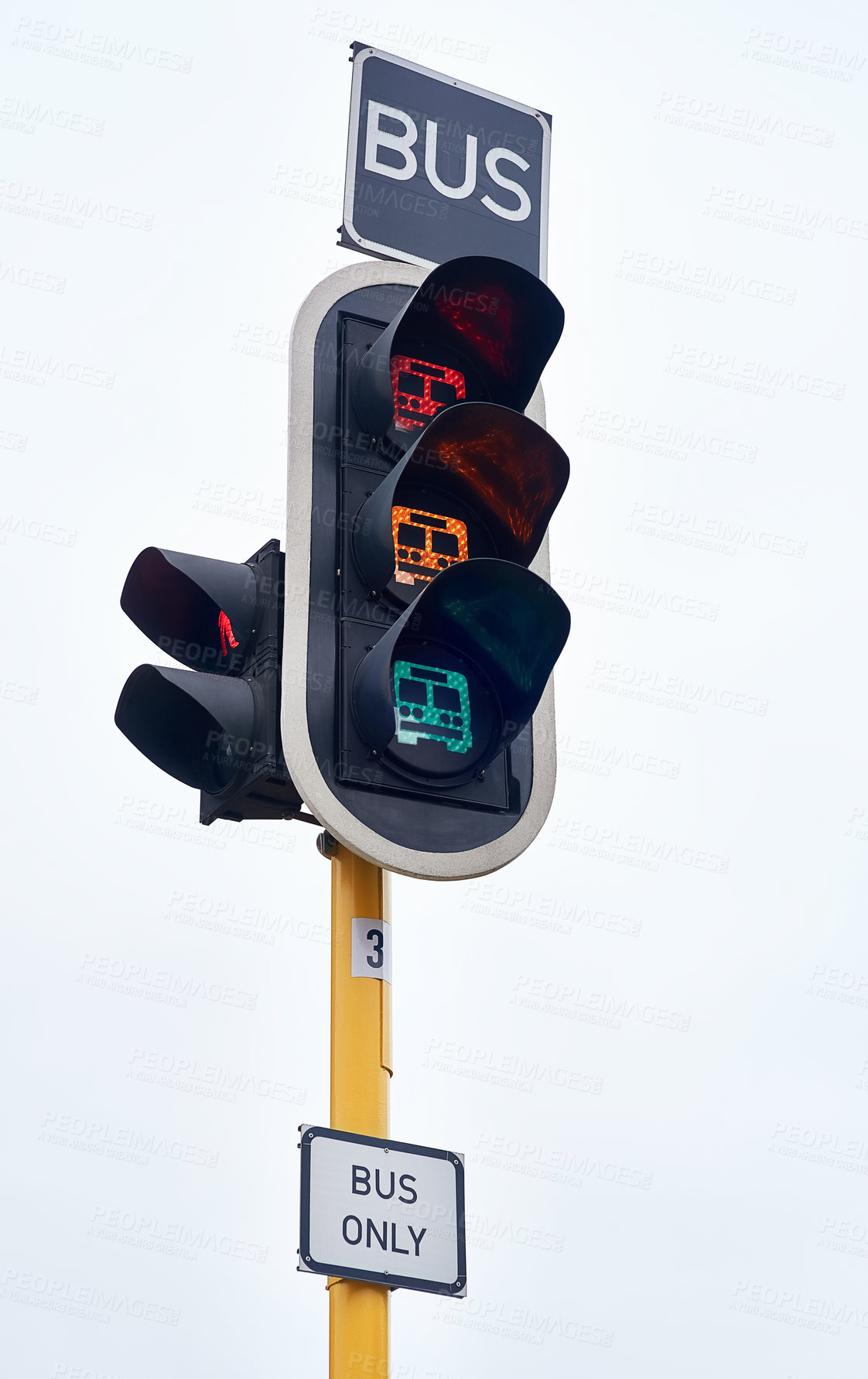 Buy stock photo Traffic light, bus and street safety at intersection for caution warning or commute, downtown or city. Sign, transport and driving rules for urban security or road travel, direction or infrastructure