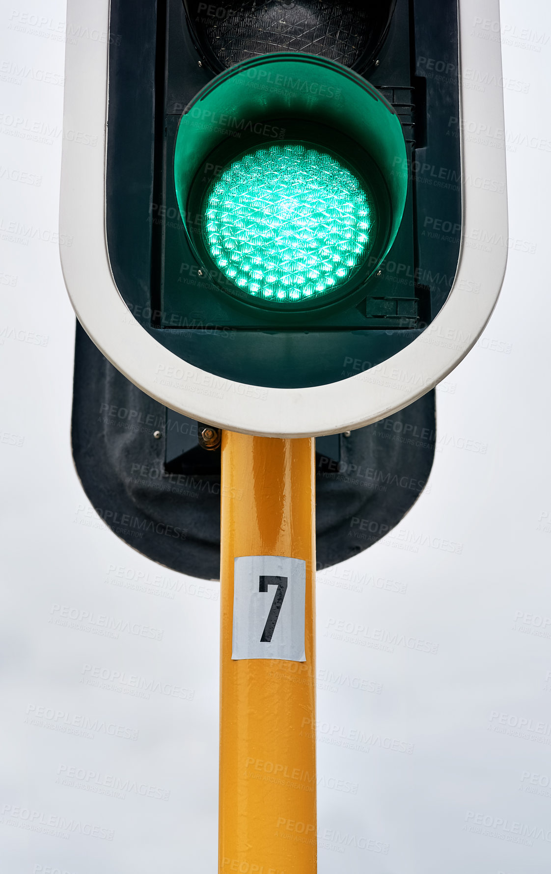 Buy stock photo Green traffic light, city or outdoor sign for control, movement or rules for safety on urban street. Go symbol, background or icon for road, sidewalk or signal for public or transportation in town