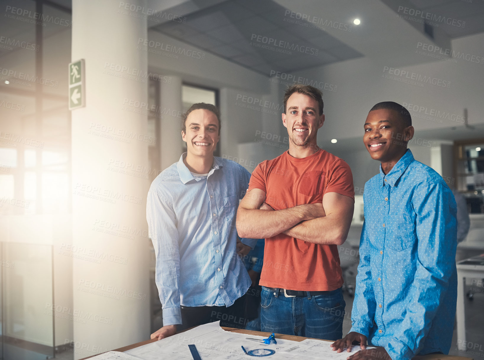 Buy stock photo Portrait of three architects standing in an office