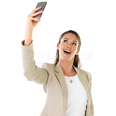 Buy stock photo Shot of a young woman taking a selfie against a white background