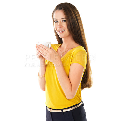 Buy stock photo Shot of a young woman holding a cup of coffee against a white background
