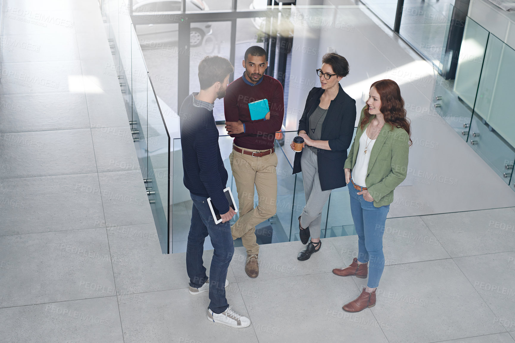 Buy stock photo Discussion, diversity and business people in office for teamwork and collaboration. Happy, conversation and group of professional creative designers working, bonding and talking in workplace.