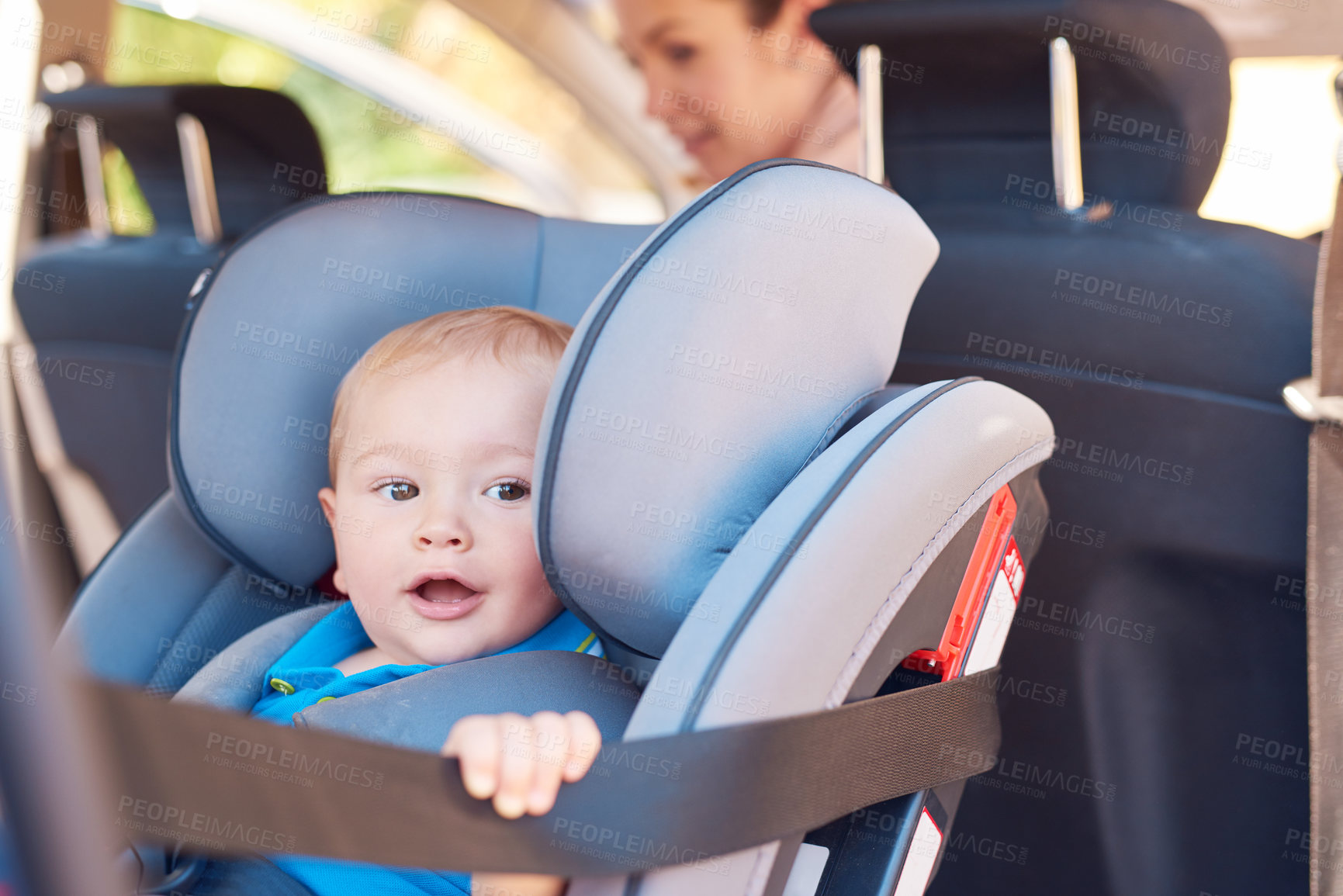 Buy stock photo Cute, baby and car seat with mother for safety, travelling and transportation. Happy, toddler and woman together in vehicle for road trip, adventure or drive to play date or park for bonding