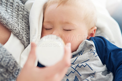Buy stock photo Mother, baby and feeding with maternity, home and love for child development and milk bottle. Mom, kid and sleeping with growth, motherhood and parenting with family house and bonding in bedroom