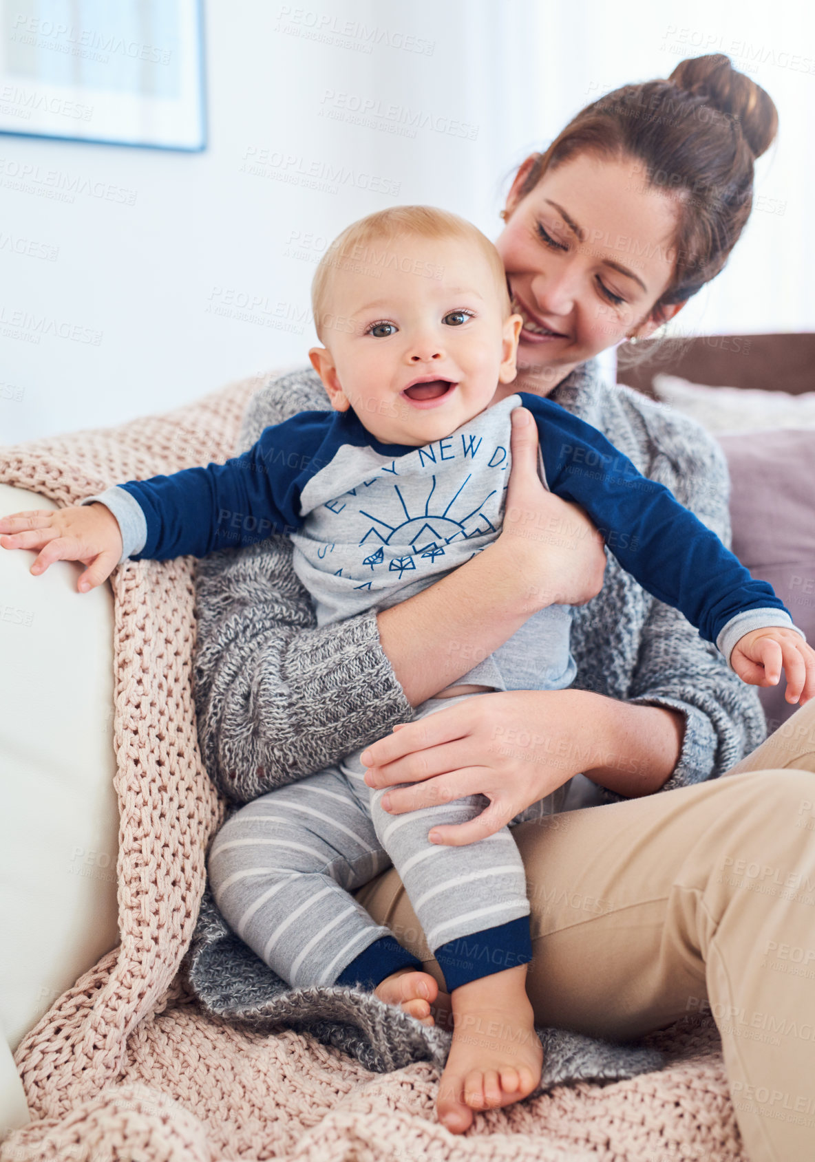 Buy stock photo Mom, baby and happy in couch with support, love and cute as toddler for growth and child development. Parent, kid and portrait at home with playing for bonding, childhood memories, smile and care