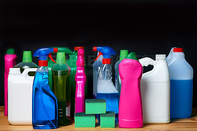 Buy stock photo Shot of various bottles of detergents isolated on black