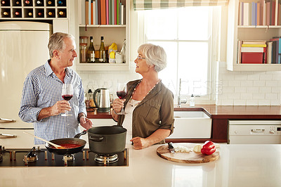 Buy stock photo Wine, happy or old couple cooking food for a healthy vegan diet together with love in retirement at home. Smile, support or senior woman drinking or talking in house kitchen with husband at dinner 