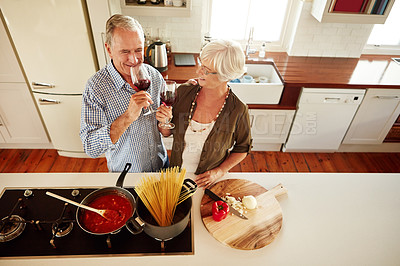 Buy stock photo Top view, wine or old couple cooking food for a healthy vegan diet together with love in retirement at home. Happy senior woman drinking or bonding in house kitchen with mature husband at dinner 