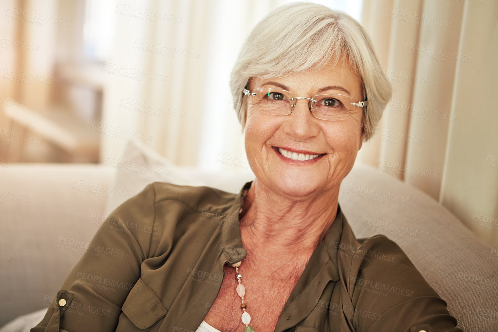 Buy stock photo Cropped portrait of a senior woman at home