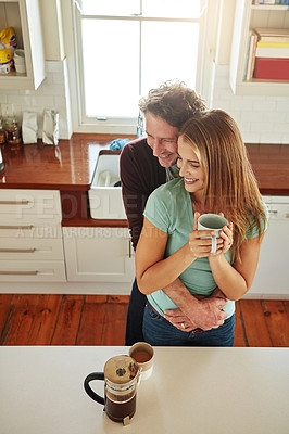 Buy stock photo Hugging, coffee or happy couple speaking in kitchen at home bonding or enjoying quality time together. Embrace, affection or above of mature man relaxing or drinking espresso tea with woman at home