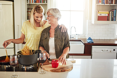 Buy stock photo Hug, happy mother or woman cooking food for healthy vegan diet together with love in family home. Smile, embrace or adult child hugging or helping senior mom in house kitchen for lunch meal or dinner
